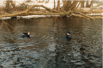 Divers searching a river during the search for Katrice